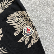 Load image into Gallery viewer, Moncler Polo Black Floral Size Medium
